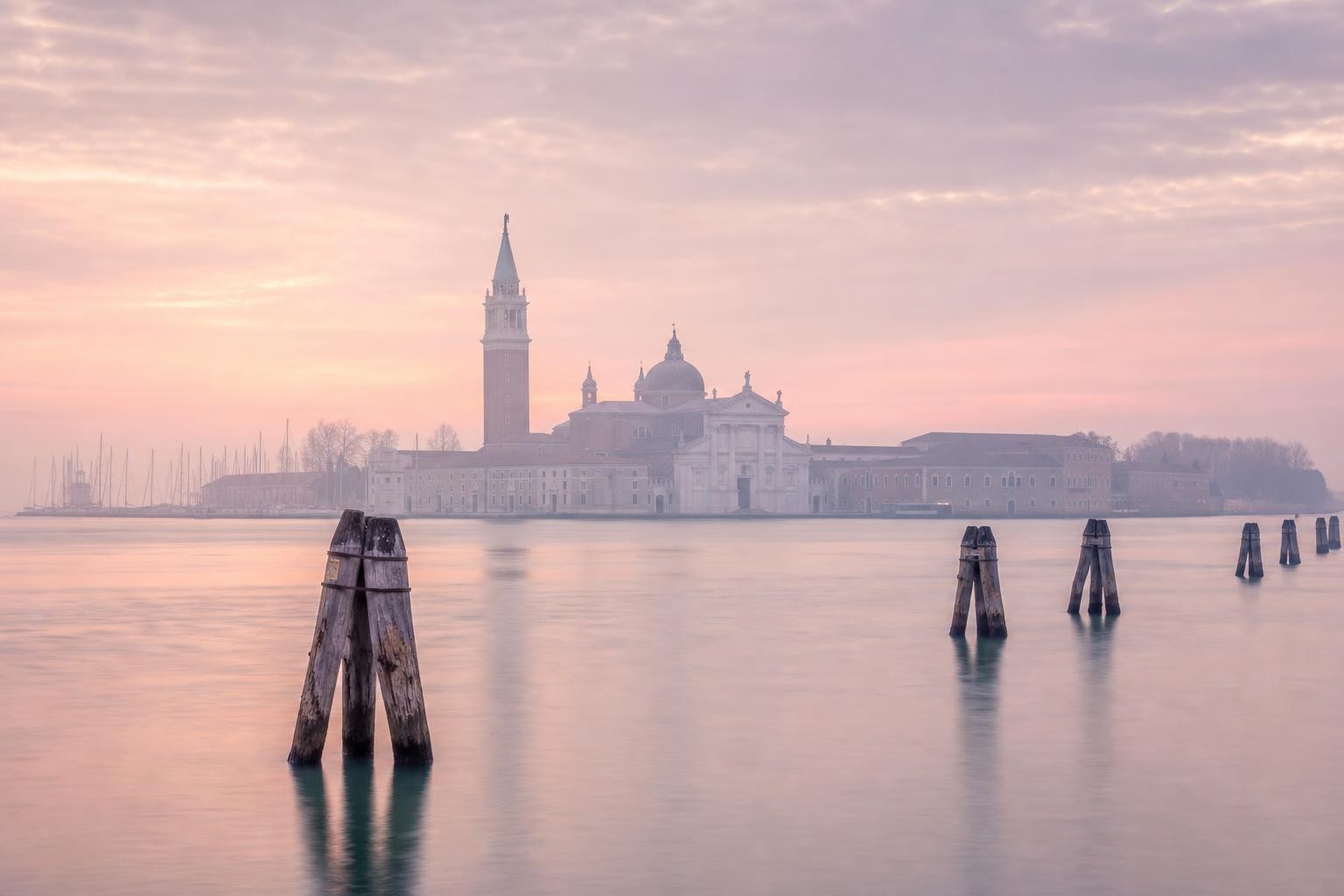 Misty pastel dawn over the Venetian lagoon, San Giorgio in the distance